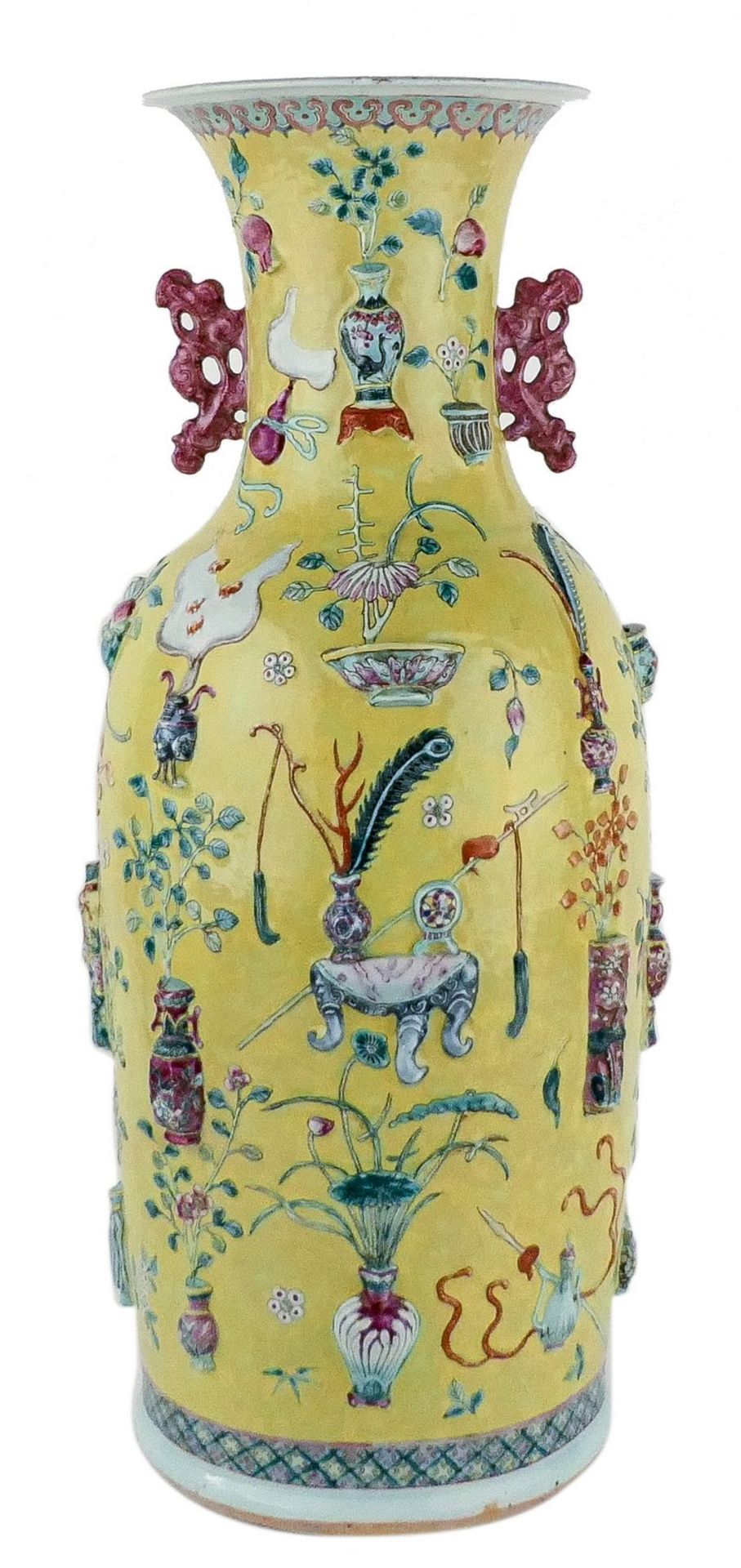 A Chinese yellow ground famille rose vase, decorated with moulded antiquities and flower branches,