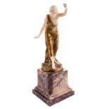 Illegibly signed (Susse?), chryselephantine statue on a marble base, bronze and ivory, H 24 cm