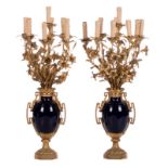 A pair of Nap. III-style candlesticks in blue glazed pottery with rich bronze mounts, H 96 cm (minor