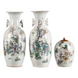 Two Chinese famille rose and polychrome decorated vases with gallant garden scenes (chips to the