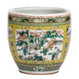 A Chinese yellow ground famille verte fish bowl, the roundels decorated with an animated scene,