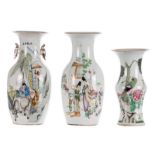 Two Chinese famille rose and polychrome decorated vases with a garden scene and an animated scene;