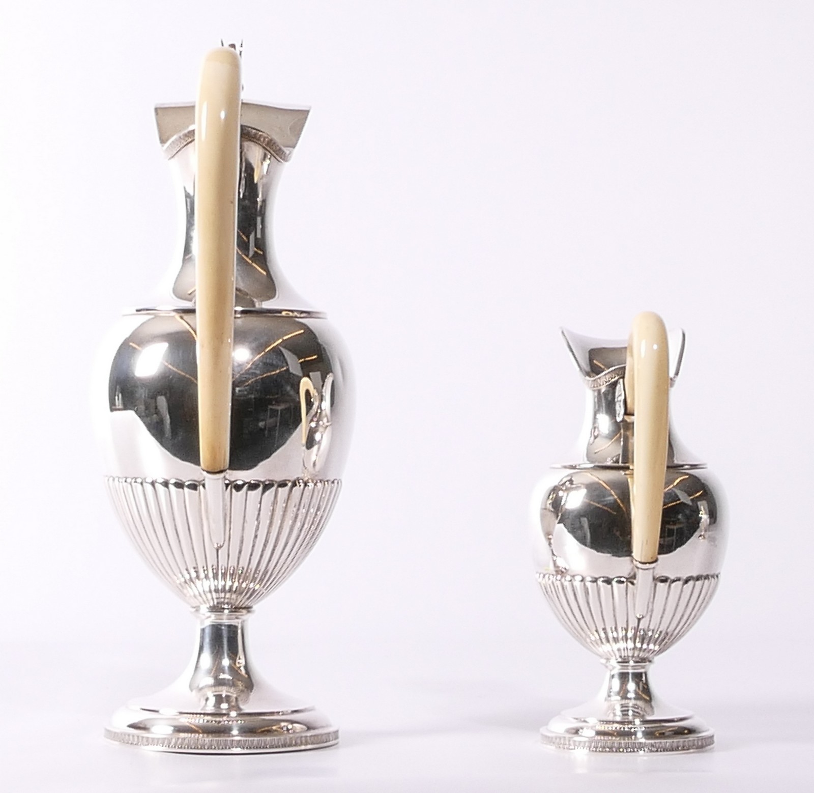 A four-piece silver tea and coffee set with ivory handles, Wolf-Zondervan, 835/000, 1942-1954; added - Image 9 of 19