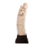 Our Lady with child, mammoth ivory on an oak Gothic revival base, probably workshop Heckman Paris,