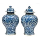 Two Chinese blue and white vases and covers, decorated with phoenix and floral motifs, 19thC, H 43,5