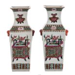 Two Chinese famille rose quadragular vases, decorated with flower baskets and vases and calligraphic