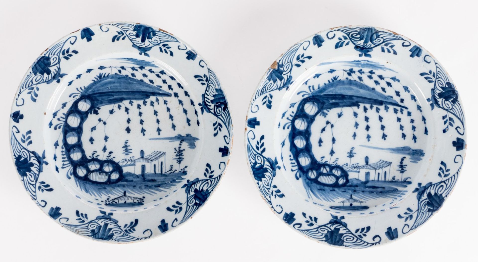 A pair of 18thC tin glazed and bleu decorated Dutch Delftware plates, (the usual glaze flaking to - Image 12 of 16