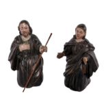 A polychromed limewood Joseph and Mary (part of a Christmas crib), probably German, 19thC, H 19