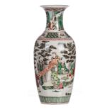A Chinese famille verte vase, overall decorated with literati in a garden, H 45 cm