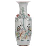 A Chinese polychrome decorated vase with a garden scene, H 59 cm (crack to the body)