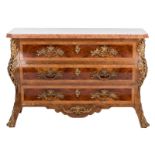 A mahogany and walnut veneered chest of drawers a la régence, bronze mounts and Rosso Verona