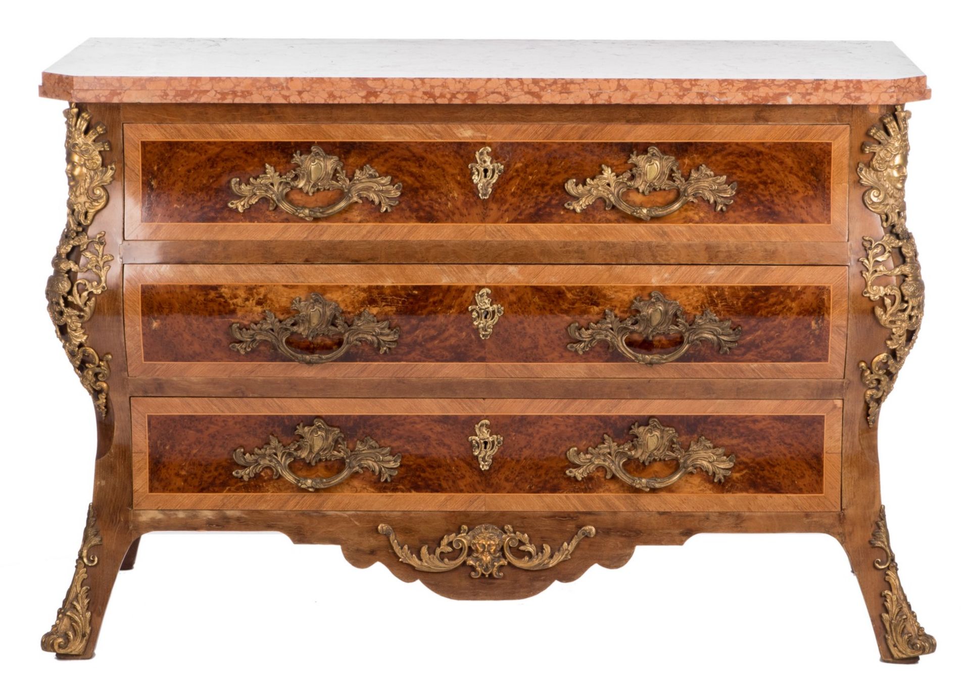 A mahogany and walnut veneered chest of drawers a la régence, bronze mounts and Rosso Verona