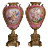 A pair of, probably, Sèvres vases with neoclassical bronze mounts, the decoration with "Rose