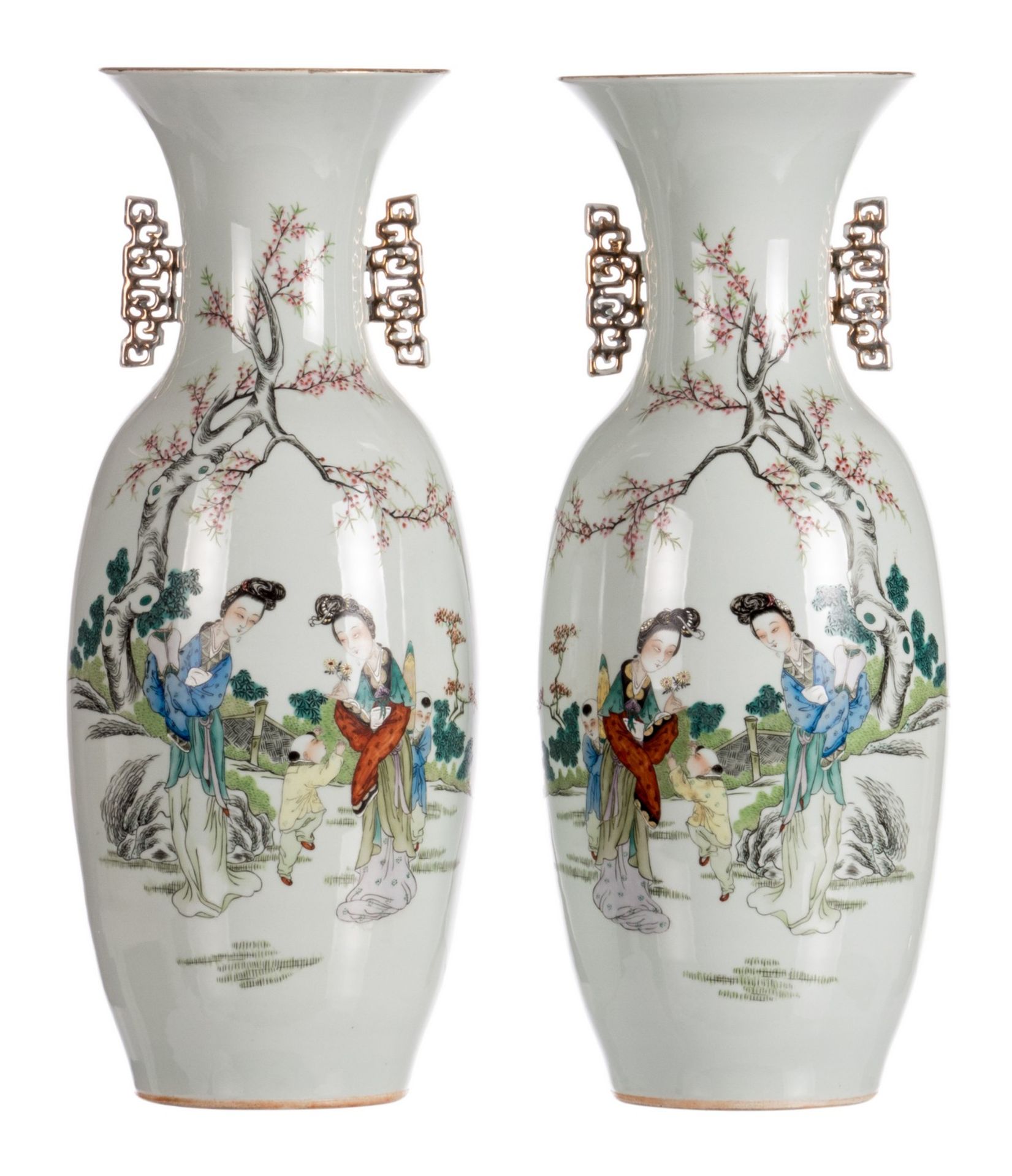 A pair of Chinese polychrome decorated vases with court ladies and children in a garden and
