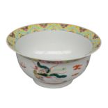 A Chinese polychrome bowl, decorated with butterflies and flowers, marked Kangxi (1662 - 1722),