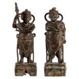 Two Chinese bronze temple guards, Ming, with traces of gilt and polychromy, H 38 - 40,5 cm (damage)