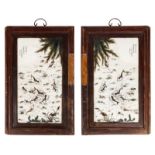 A pair of Chinese polychrome decorated plaques depicting shrimps and a crab, in a wooden frame,