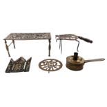 A typical Flemish candlestick with stock facility, 18thC, two ditto iron rests, a coaster and a