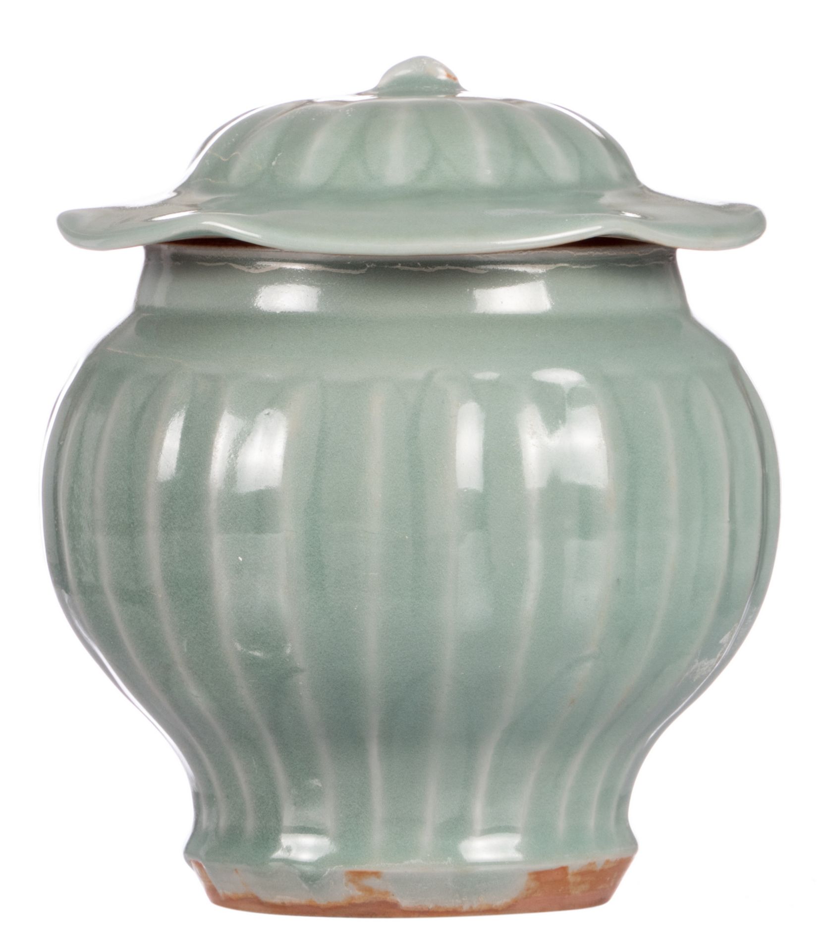 A Chinese celadon with relief jar and cover, type Ming, H 25,5 cm