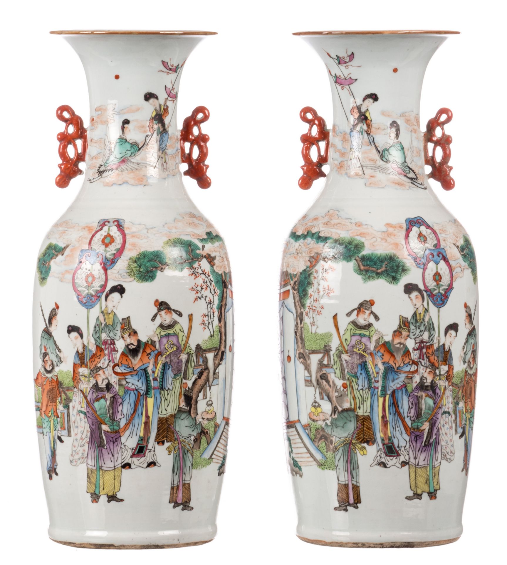 A pair of Chinese polychrome vases, decorated with an animated scene, flower branches and