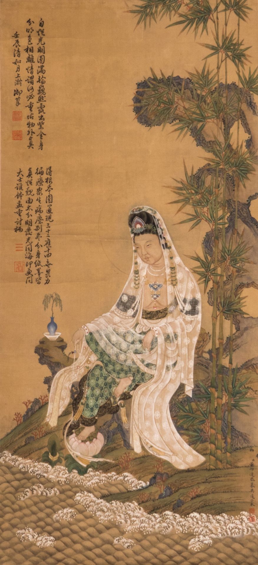 A Chinese scroll depicting Guanyin situated in a landscape near a rippling river, 38 x 84 - 54 x 168