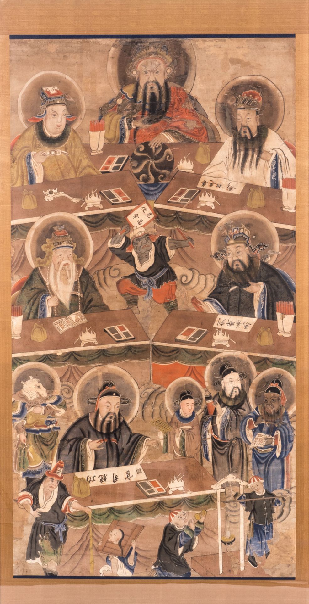 A Chinese scroll, framed, silk mount, depicting the Ten Kings of Hell, ink and colour on paper,