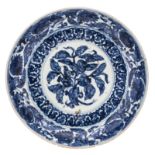 A Chinese blue and white floral decorated plate with pomegranates and flowers, H 6 - ø 32 cm