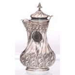 A 19thC French Rococo revival silver egoiste with an ebony handle, H 18 cm - Total weight: about