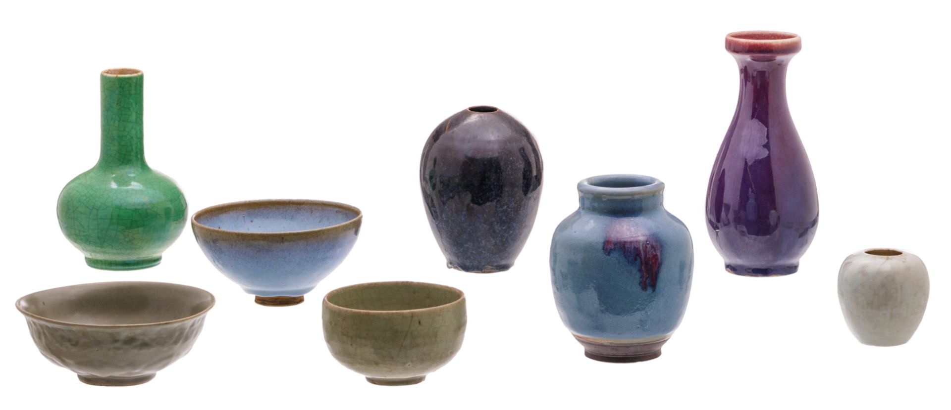 A various Chinese celadon and flambé glazed vases and bowls, some marked; added a Chinese