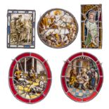 Three 16th - 17thC round and oval polychrome stained glass roundels: one depicting a goal with