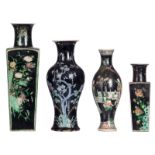 Two Chinese famille noire quadrangular vases and two ditto baluster shaped vases, decorated with