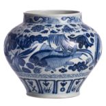 A Chinese blue and white overall decorated vase with fish and lotus flowers, H 28 cm