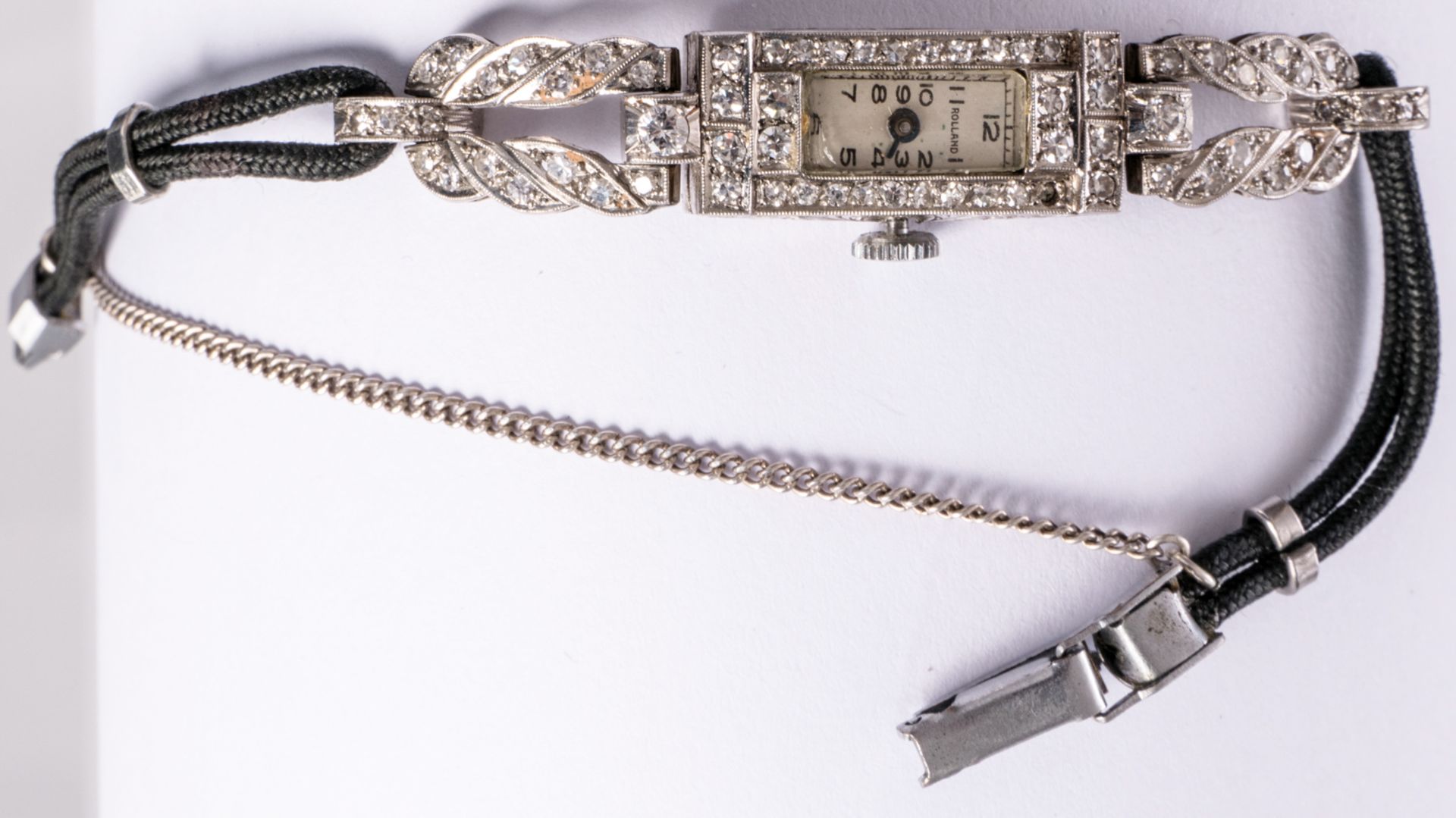 A platina Art Deco period ladies wrist watch set with brilliant cut diamonds, mark 'Rolland' - - Image 3 of 4