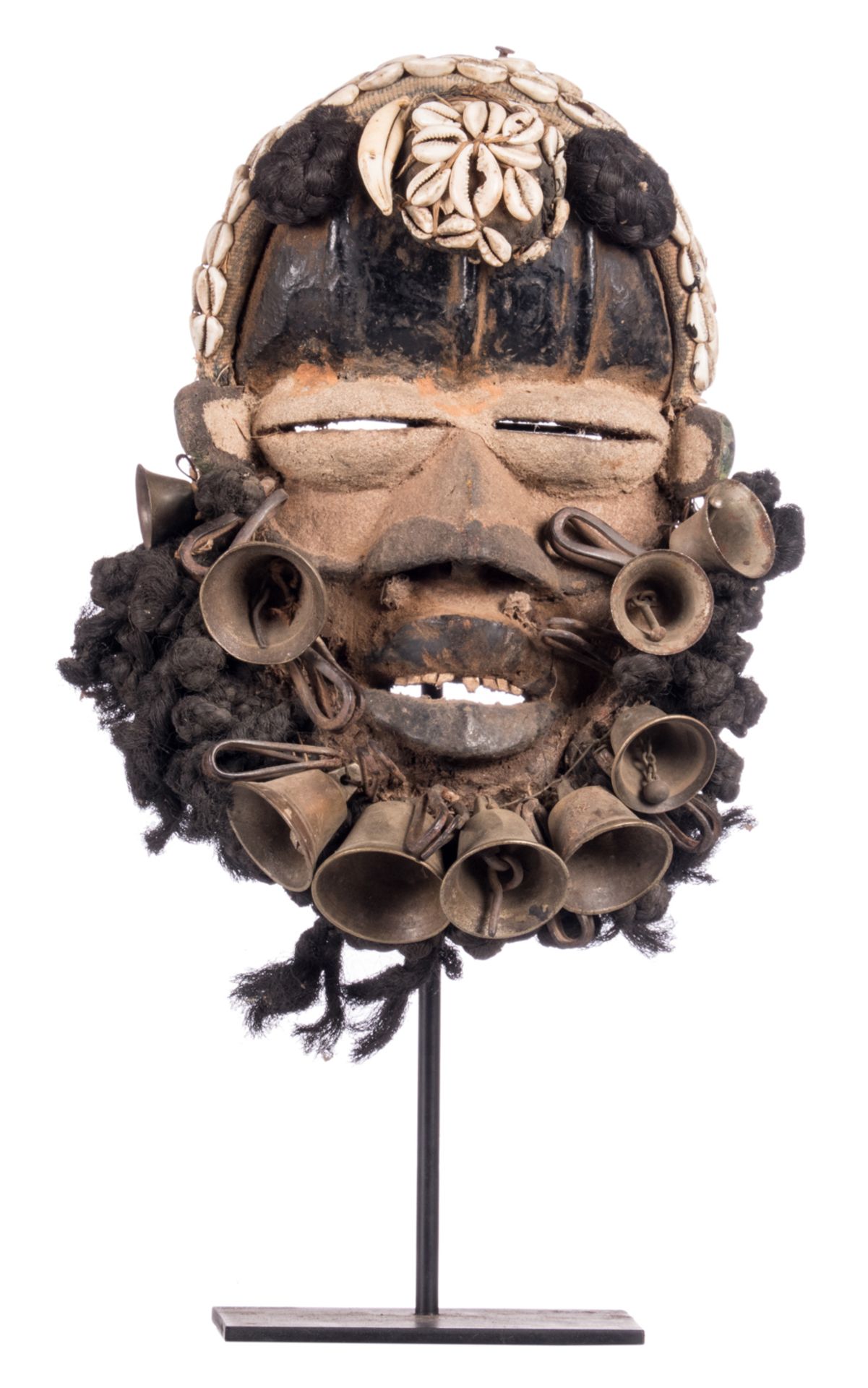 A traditional African wooden mask with shells and bells, Guéré - Ivory Coast, H 29 - W 22 cm (