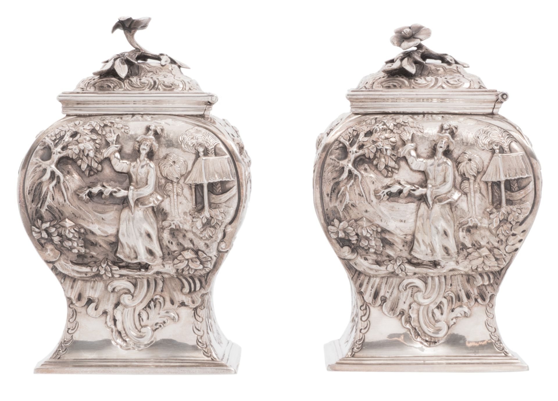 A pair of George II sterling silver chinoiserie decorated tea caddies, London hallmark, date