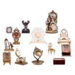 An important collection of pocket watch holders, one 8ct gold, 19th and early 20thC, H 10,5 - 22 cm