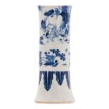 A Chinese blue and white overall decorated Gu vase with flower branches, figures and an elephant,