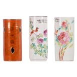 Two Chinese cylindrical vases, polychrome decorated with a bird on flower branches and a