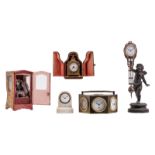 A combination clock, a small table clock in a maroquin leather box, a small Neoclassical pendulum, a