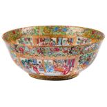 A Chinese famille rose floral decorated Canton bowl, the roundels with court scenes, 19thC, H 16 - ø