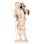 A Japanese ivory okimono depicting a wood collecting woman, late 19thC, some tinted carving, H 17,