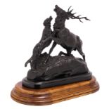 Unsigned, a hunting scene in the manner of Mène, black lacquered cast iron on an ebonised wooden