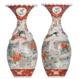 A pair of Japanese Meiji period dragon relief and kakiemon decorated vases, H 60 cm