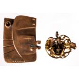 Minnebo H., a red copper belt buckle, dated (19)78, H 7,1 - W 9,4 cm; added René (Solé), a red