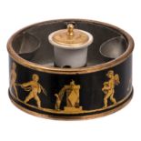 A round Neoclassical lacquered and gilt tole inkwell, gilt brass mounts and a porcelain ink