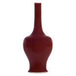 A Chinese sang de boeuf bottle vase with a Kangxi mark, H 40 cm