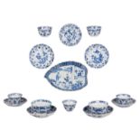 Three sets of Chinese blue and white floral decorated cups and saucers, some marked, Kangxi and