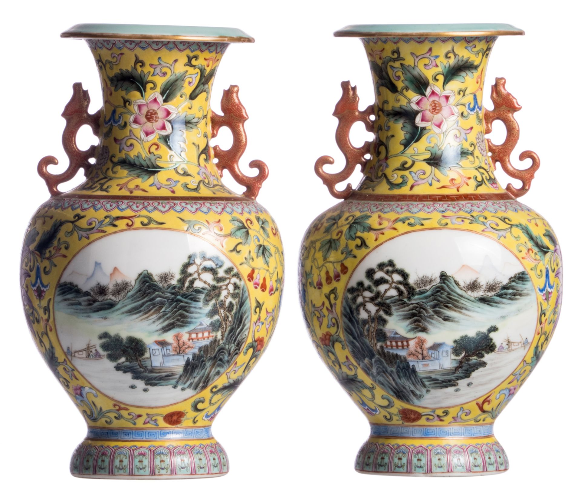 A pair of Chinese yellow ground polychrome and floral decorated vases, the roundels with mountainous