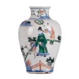 A Chinese wucai vase, overall decorated with figures on a terrace, H 18,5 cm