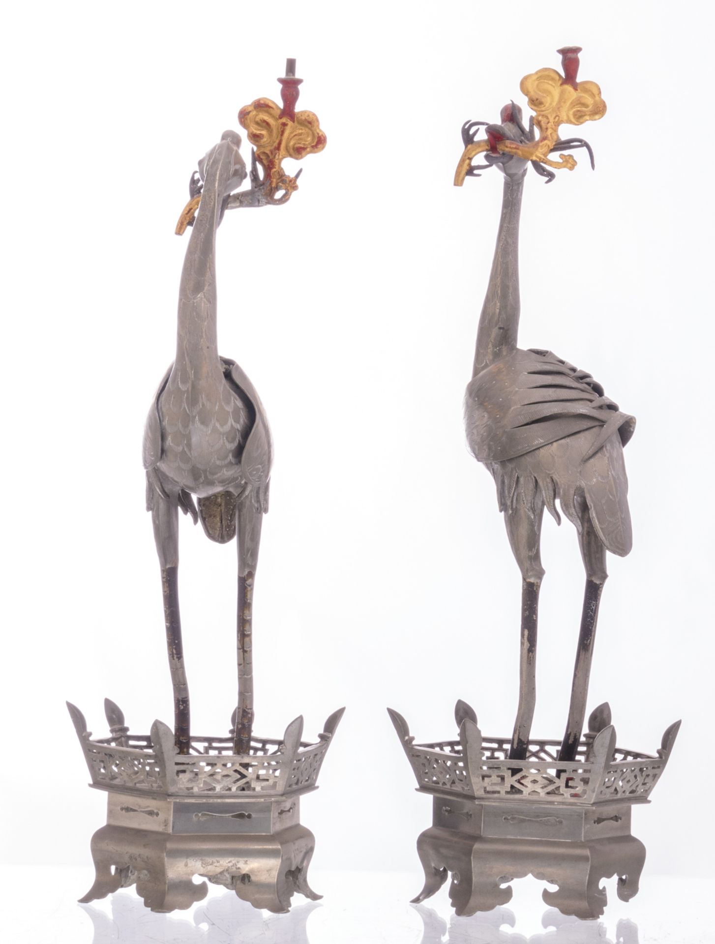 A Chinese pair of polychrome decorated pewter candlesticks, modelled as cranes, marked, H 48 cm - Bild 4 aus 7